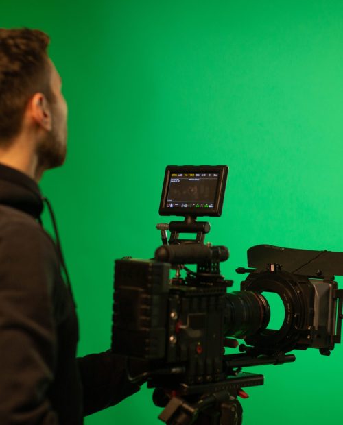 cameraman uses camera in studio